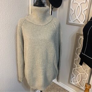 Silver leaf tan long cowl neck sweater made from acrylic and mohair.